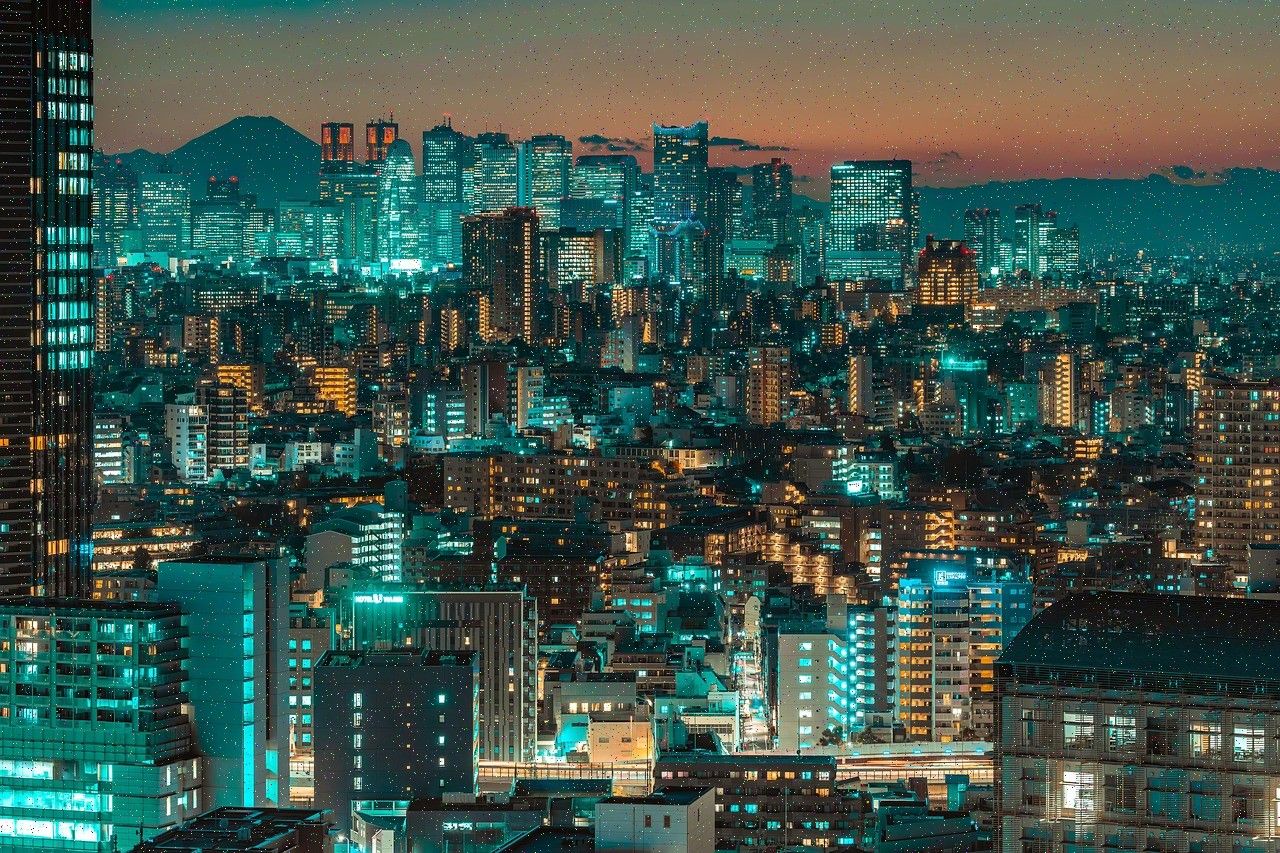 Dense city lit up at night