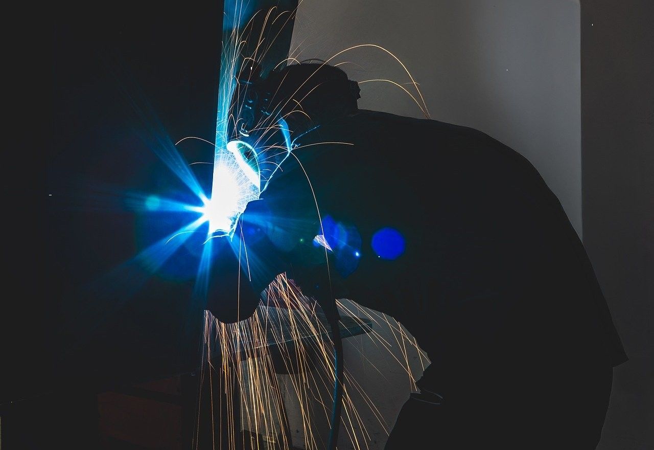 Welding sparks in a set construction workshop